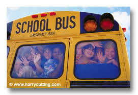 kids on back of school bus